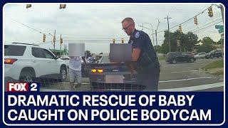 Dramatic rescue of baby caught on police bodycam