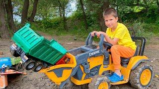 Darius Plays with Tractors in mud helping people and learns road rules  Kids adventures