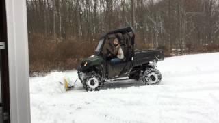 Honda Pioneer 700 Plowing Snow
