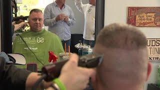 Cops shave heads in support of boy with brain cancer