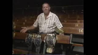 Fritz Von Erich shows the World Class Belts. WCCW 1987