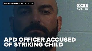 Austin cop faces child injury charges