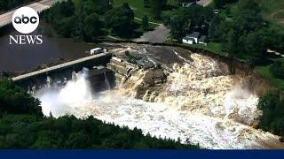 Record-breaking floods in Minnesota cause broken dam