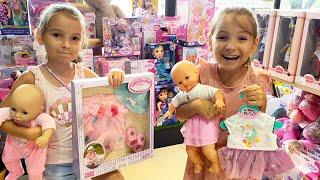 Baby doll and Baby Annabel doing shopping at toy. store Kids Video  Magic twins