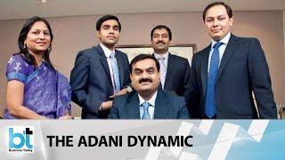 How is the relationship between Karan & Gautam Adani?