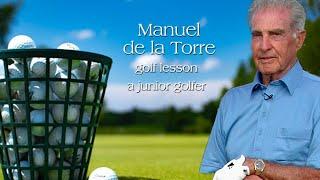 Giving a golf lesson  -- Manuel de la Torre