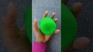 popped green stress ball