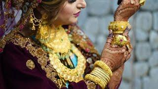 kashmiri Brides wearing heavy gold hand jewellery and jhumka  latest bridal jewellery designs 2024