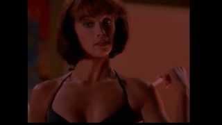 Lauren Holly in a black bikini