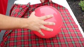 He wraps a ball in fabric for this genius Christmas hack