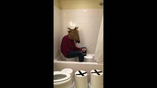 Man-horse plays Africa by Toto on a bucket in a shower