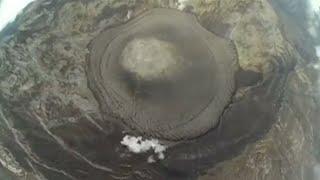 Aerial footage of cold lava spewing from Mount Agung in Bali