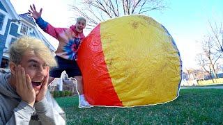 THE WORLDS LARGEST BEACHBALL WE POPPED IT 