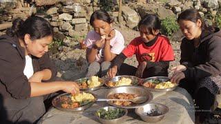 village girls eating dhido with chicken curry gundruk and spinach