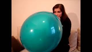 Amazing Girl Blow to Pop a Green Balloon