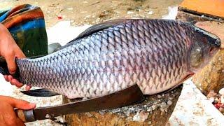 Rohui Fish Cutting And Slicing At Knife In The Fish Market