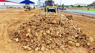 Amazing Strong Equipment Bulldozer Pushing Dirt Rocks With Dump Trucks Dumping Dirt Filling Up Land