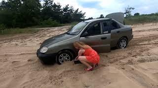 Anya driving through the sand and getting stuck