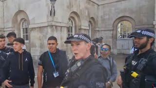 It is disrespectful he is a working soldier armed police tell them to get out #thekingsguard