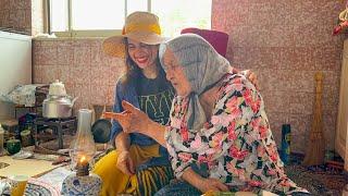 Grandmas kitchen in a country house  village girl Cooking beans and pilaf