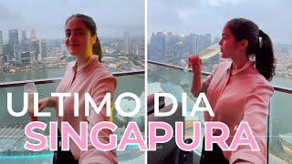 ops  bebi um champagne em um rooftop em Singapura