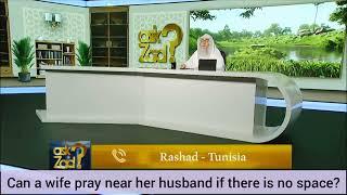 Can a wife pray near husband if theres no space her head touches his knees in ruku Assim al hakeem