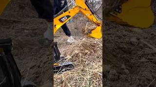 CAT excavator truck assembling sand and stones