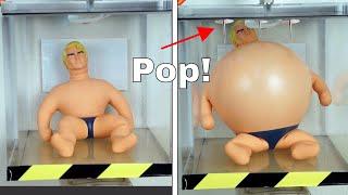 Stretch Armstrong in a Vacuum Chamber and a Microwave—An Explosive End