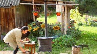 One day in the life of a friendly family in a remote village  Cooking pancakes on the fire