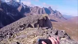 Srambling up ridge above Talus Lake Tombstones Yukon Territory