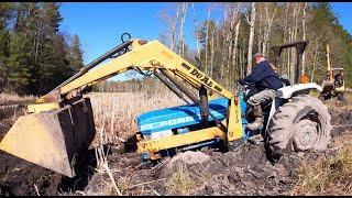 Pulling out a stuck tractor