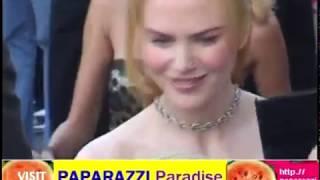 TOM CRUISE and NICOLE KIDMAN keep their distance after divorce