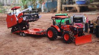 รถไถ Kubota M 108 ขนรถเกี่ยว   DC 108 แต่ต้องเจออุปสรรค