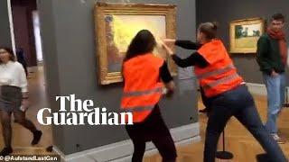 Climate change activists throw mashed potato at Monet painting