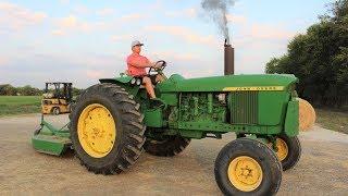 Tractors working on the farm  Real tractors mowing with our shredder