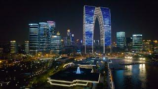 Spectacular cities of China at night recorded by aerial and static photographic masters.