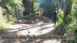 Bulldozer pushing the mud and soil with tree on road  complete 100 %  bd2f mitsubishi working