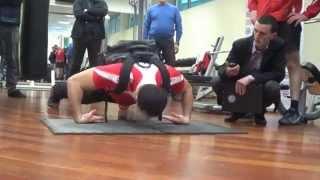 Most push ups using back of hands carrying 60 lb pack in one minute - Ioseb Khutsishvili