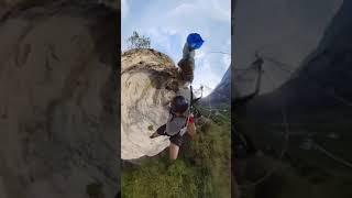 Base jumpers parachute snags on bush