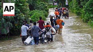 Waters start to recede in Bangladesh after deadly floods but many stranded