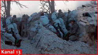 Dont stop shoot - a combat image of Ukrainian soldiers under artillery fire in a trench