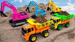 Cranes excavators concrete mixer trucks to build lego bridges for dump trucks