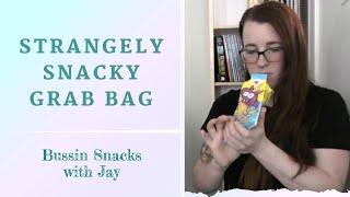 Unboxing a snack package from Bussin Snacks