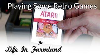 Playing  Retro Video Games - Atari gaming console