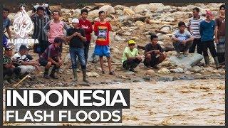 Indonesia flash floods At least 60 people killed