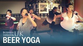 People are doing yoga while drinking beer