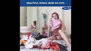 Beautiful Single Mom So Cute - Single mom is folding clothes