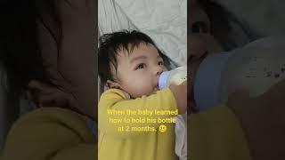 when the baby learned how to hold his bottle at 2 months. #cute