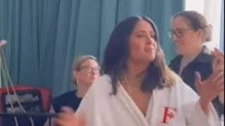 Salma Hayek suffers major wardrobe malfunction while dancing in her bathrobe