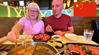 My moms first time trying CHINESE HOT POT wow 